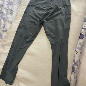 Gray leggings up to Calves w/ side pockets.